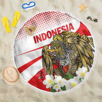 Red and white round beach blanket with fringe, Indonesia lion-and-eagle graphic, flowers