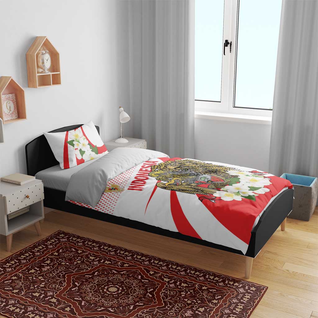 Red and white bedding set with eagle crest, flowers, and “Indonesia” text on comforter and pillows
