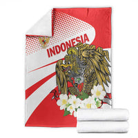 Red and white blanket with eagle, 'INDONESIA' text, and white flower design