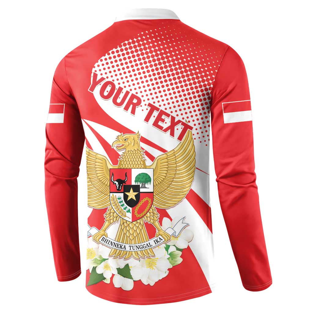 Red zip-front sweatshirt with back print of eagle wings and floral wreath motif