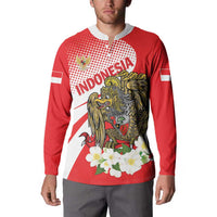 Red zip-front sweatshirt on model featuring front eagle emblem and white flower graphic