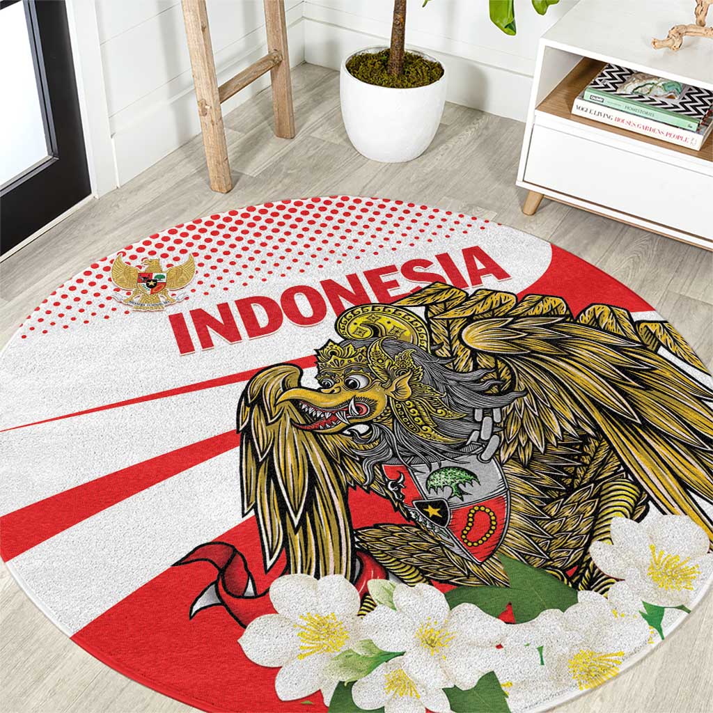 Round Indonesia carpet with large eagle print, red stripes, and scattered flower details