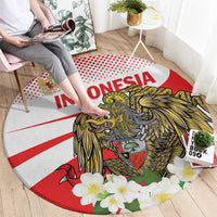 Round Indonesia graphic carpet featuring eagle artwork and floral accents on a red border