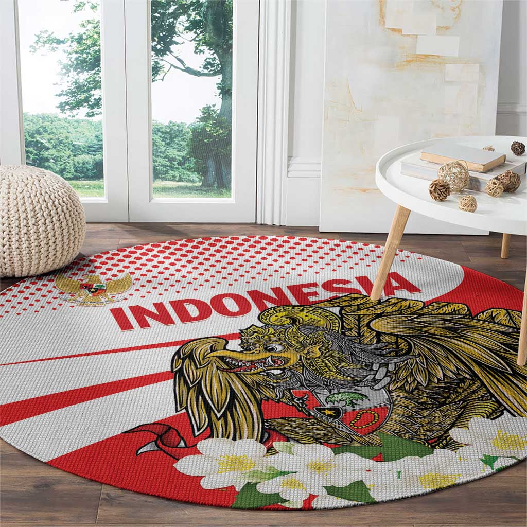 Round Indonesia carpet with bold eagle design, red stripes, and white flower clusters