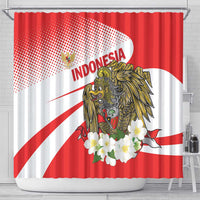 Red and white shower curtain featuring large winged eagle, Indonesia text, and floral accents