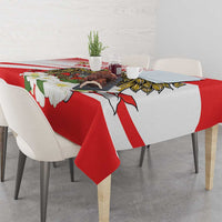 Red tablecloth with white diagonal stripes and white blossom print border