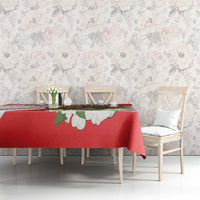Red tablecloth with hawk eagle and jasmine-style white flower motifs