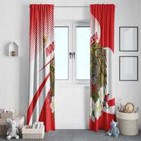 Red and white window curtains with gold eagle crest and white flower accents