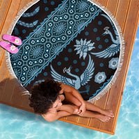Blue batik-pattern round blanket with white fringe edge, bird and floral print.