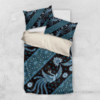 Folded view of blue batik-pattern bedding set with duvet and pillowcases