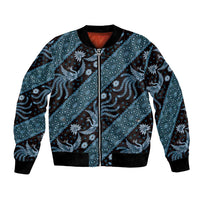 Unisex blue batik-pattern bomber jacket with center zip and ribbed black cuffs