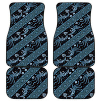 Set of four blue batik pattern car mats with rounded rectangle shape.