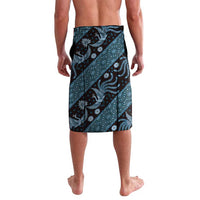 Batik-pattern wrap skirt with teal geometric stripes and white floral details, dark base