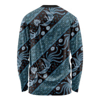 Long-sleeve crewneck batik shirt in dark blue with teal pattern, back view