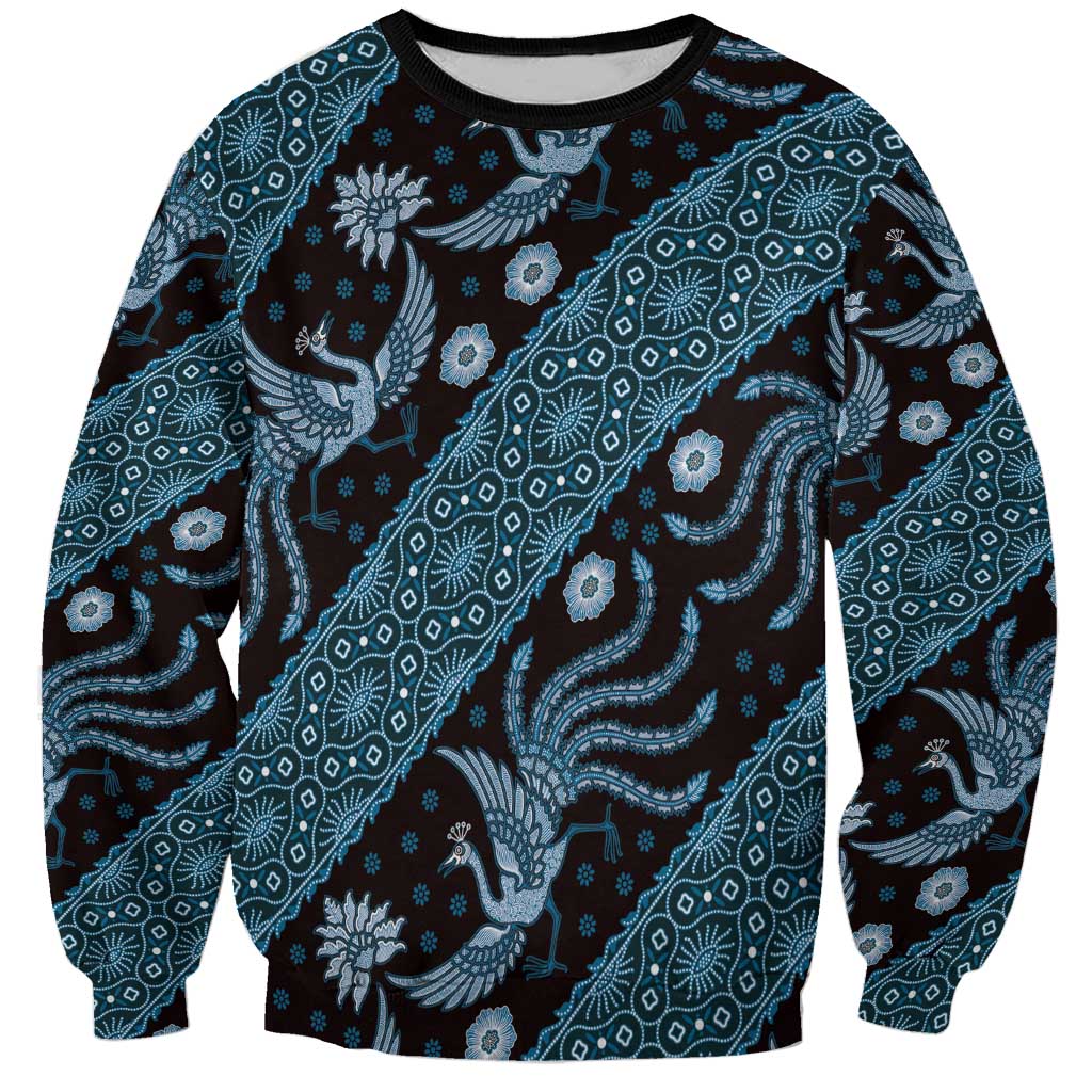 Crewneck sweatshirt with blue and dark batik-style elephant pattern, long sleeves