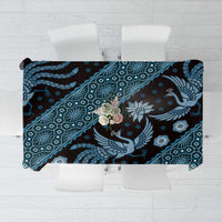 Blue batik-pattern tablecloth with dark navy and teal motifs, floral accents