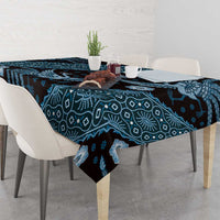 Blue batik-pattern tablecloth with teal-and-navy floral and geometric print across table