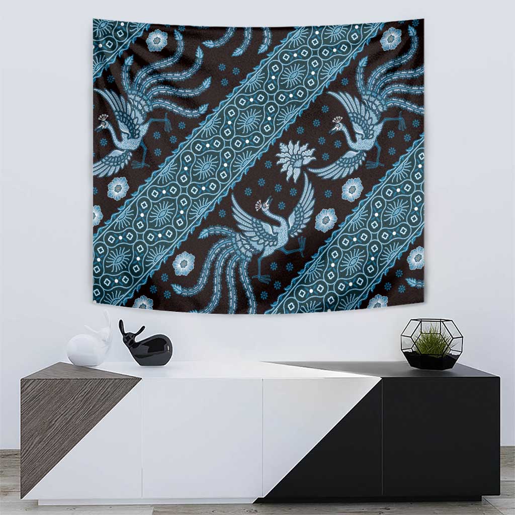 Blue batik pattern tapestry with ornate bird and flower motifs in repeating diagonal bands