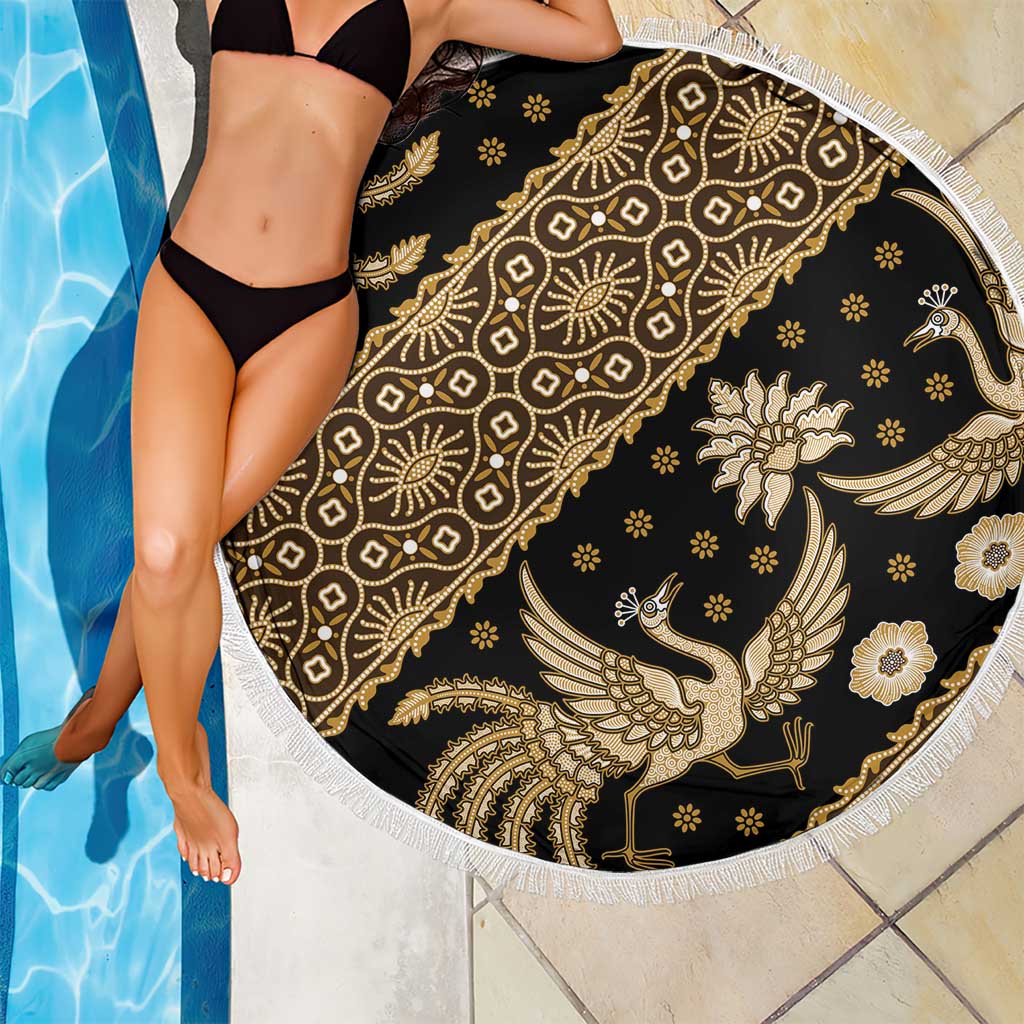 Round batik beach blanket, dark black with gold bird and floral pattern, white fringed edge