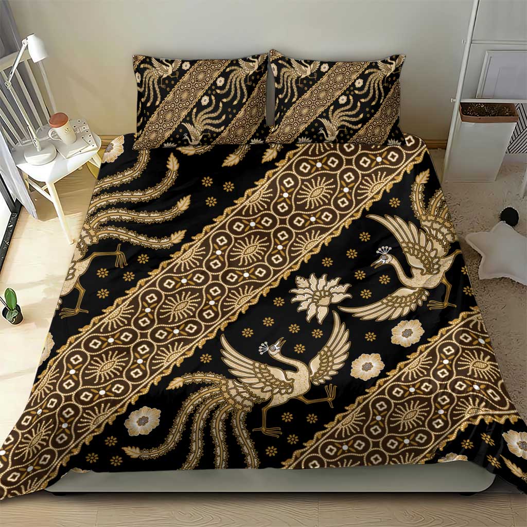Batik bedding set on bed with dark base and gold ornamental batik pattern, duvet and pillows