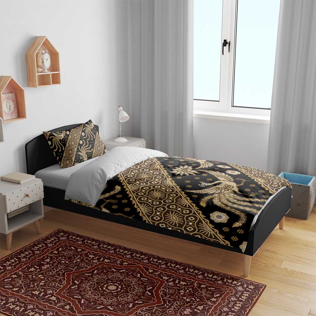 Batik bedding set on bed with dark duvet cover and gold batik pattern, two pillow covers