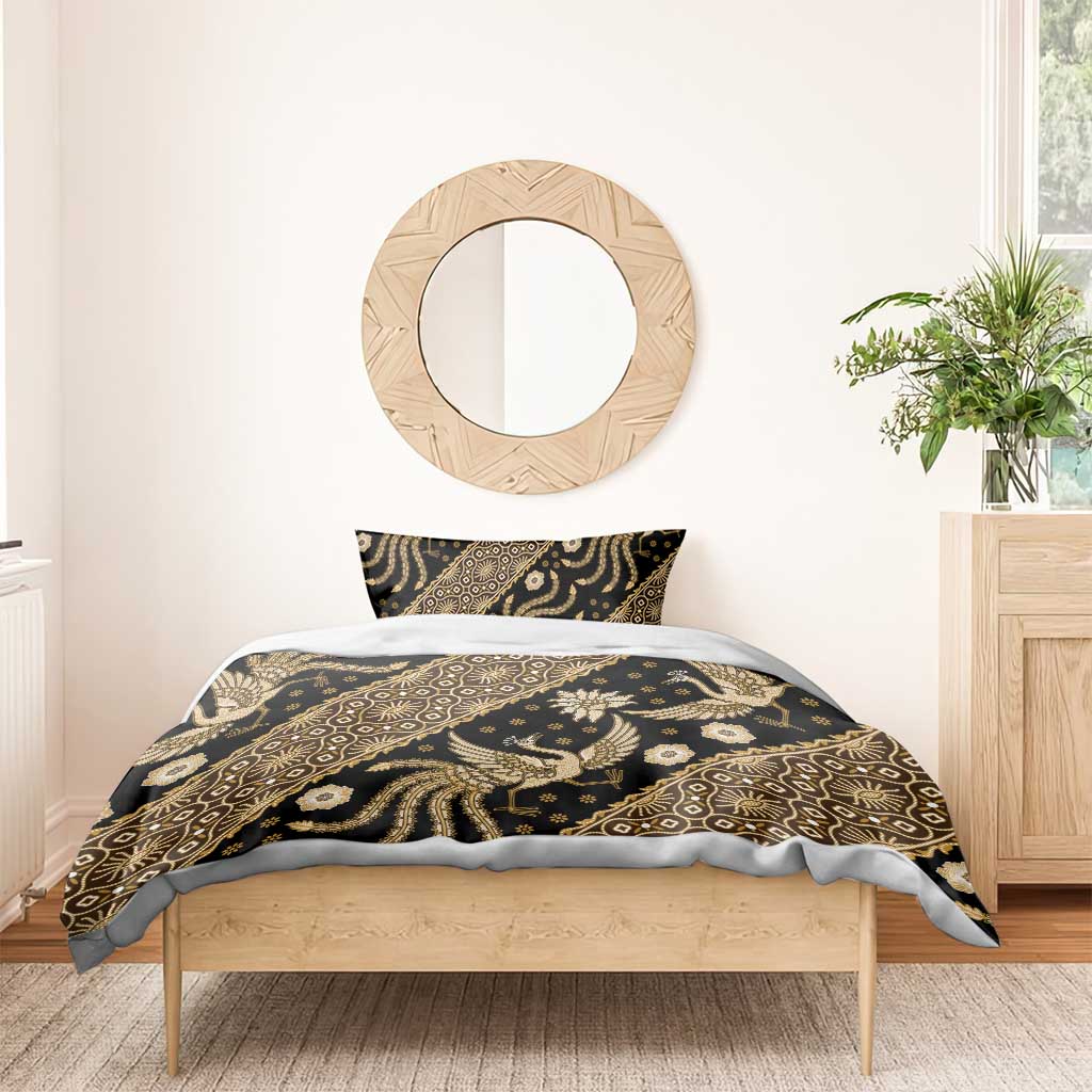 Batik bedding set with dark base and gold ornate pattern, duvet cover and pillows