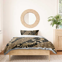 Batik bedding set with dark base and gold ornate pattern, duvet cover and pillows