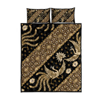 Indonesian batik quilt bed set in black with gold batik motif, quilt and two pillows