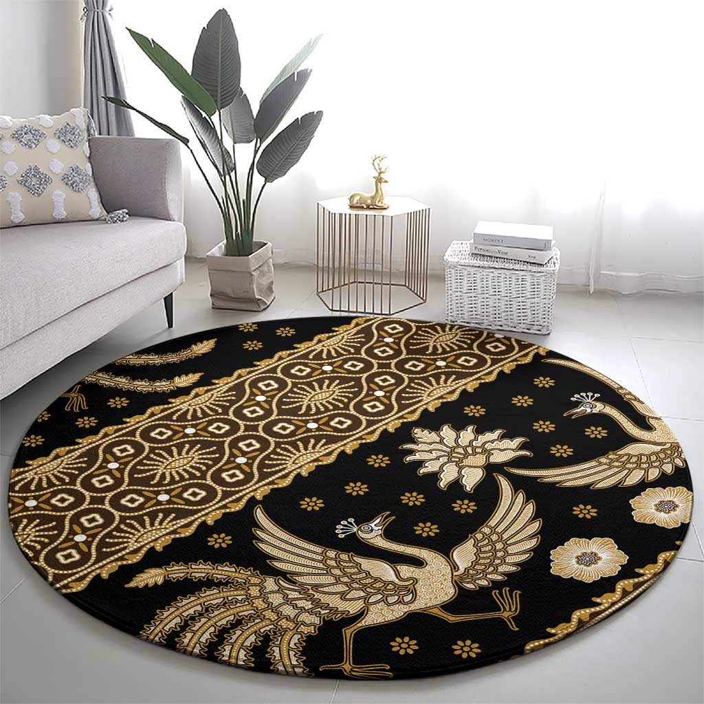 Round batik pattern carpet in dark and gold, featuring bird and floral motifs