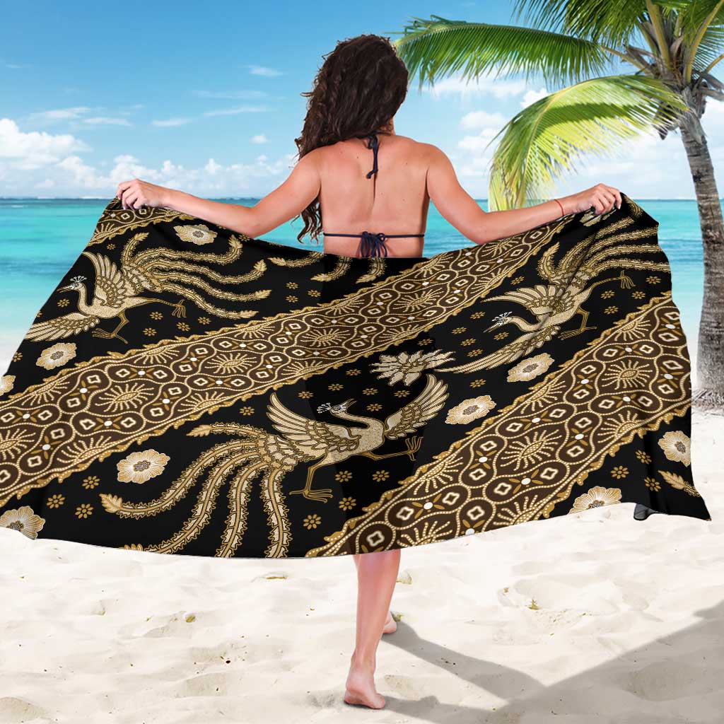 Batik sarong with large drape, black with gold decorative pattern