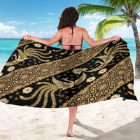 Batik sarong with large drape, black with gold decorative pattern