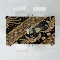 Rectangle batik tablecloth with dark base and gold ornate bird and floral patterns