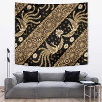 Dark batik tapestry wall hanging with gold birds and flower motifs in repeating pattern