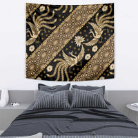 Batik-style tapestry wall hanging with diagonal lines, birds, and gold floral motifs
