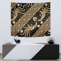 Ornate batik tapestry wall hanging with bird figures and diagonal gold pattern bands