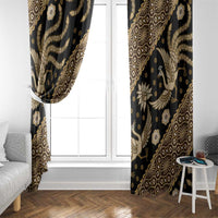 Black and gold batik-pattern window curtain panels framing the door opening.