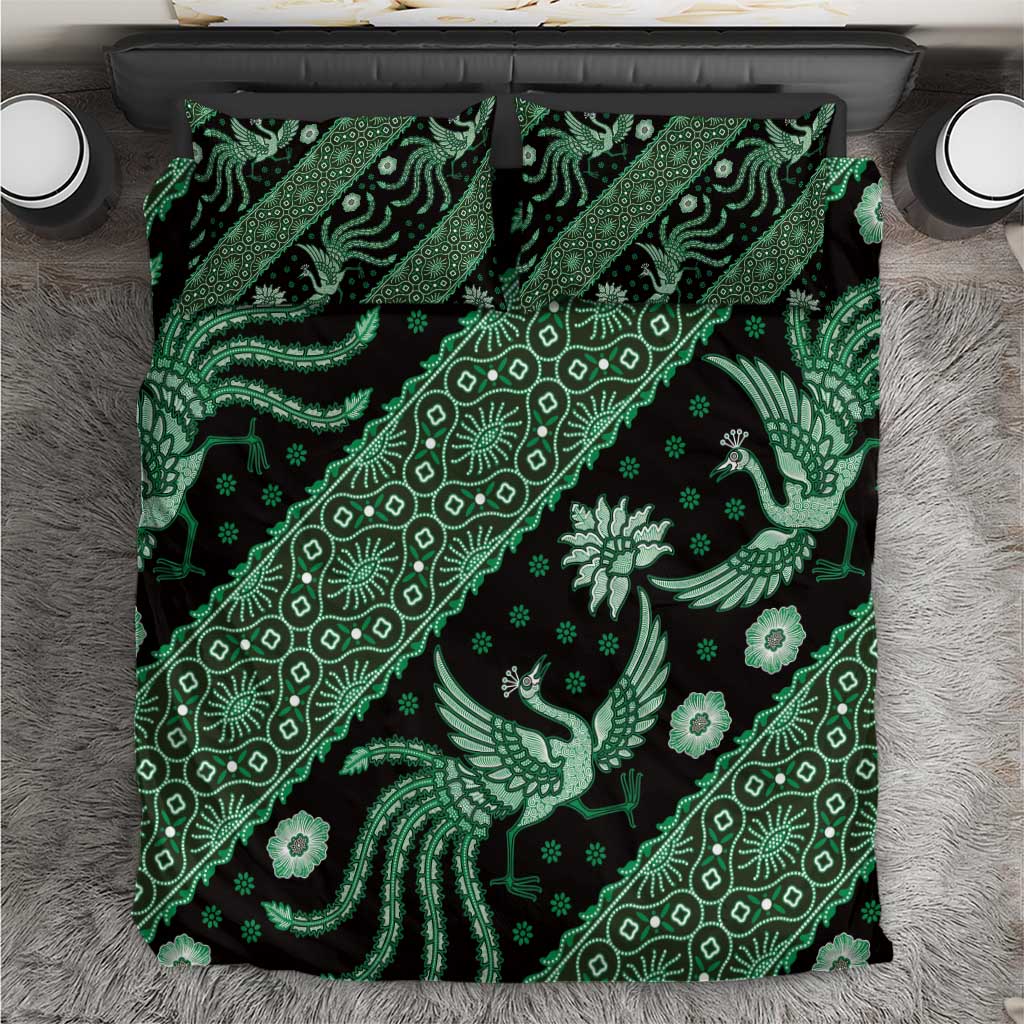 Green batik bedding set featuring a full patterned duvet cover and two pillowcases.