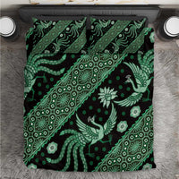 Green batik bedding set featuring a full patterned duvet cover and two pillowcases.
