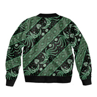 Green batik patterned bomber jacket, ribbed hem and cuffs, no visible front closure