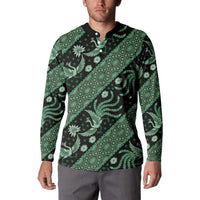 Green batik button sweatshirt with black collar and long sleeves, front view