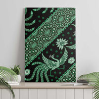 Wall-mounted batik canvas wall art with green bird and floral motifs on dark fabric