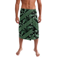 Green batik wrap skirt with dark motifs and diagonal band pattern