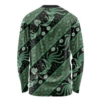 Green batik long-sleeve crewneck shirt with bird and floral motifs, black base