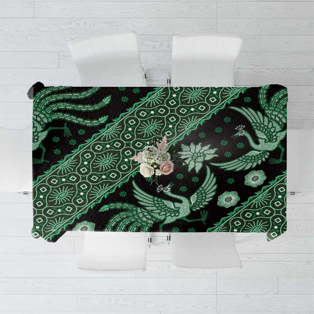 Dark green batik-pattern tablecloth with birds, floral motifs, and scroll accents