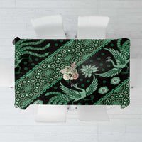 Dark green batik-pattern tablecloth with birds, floral motifs, and scroll accents