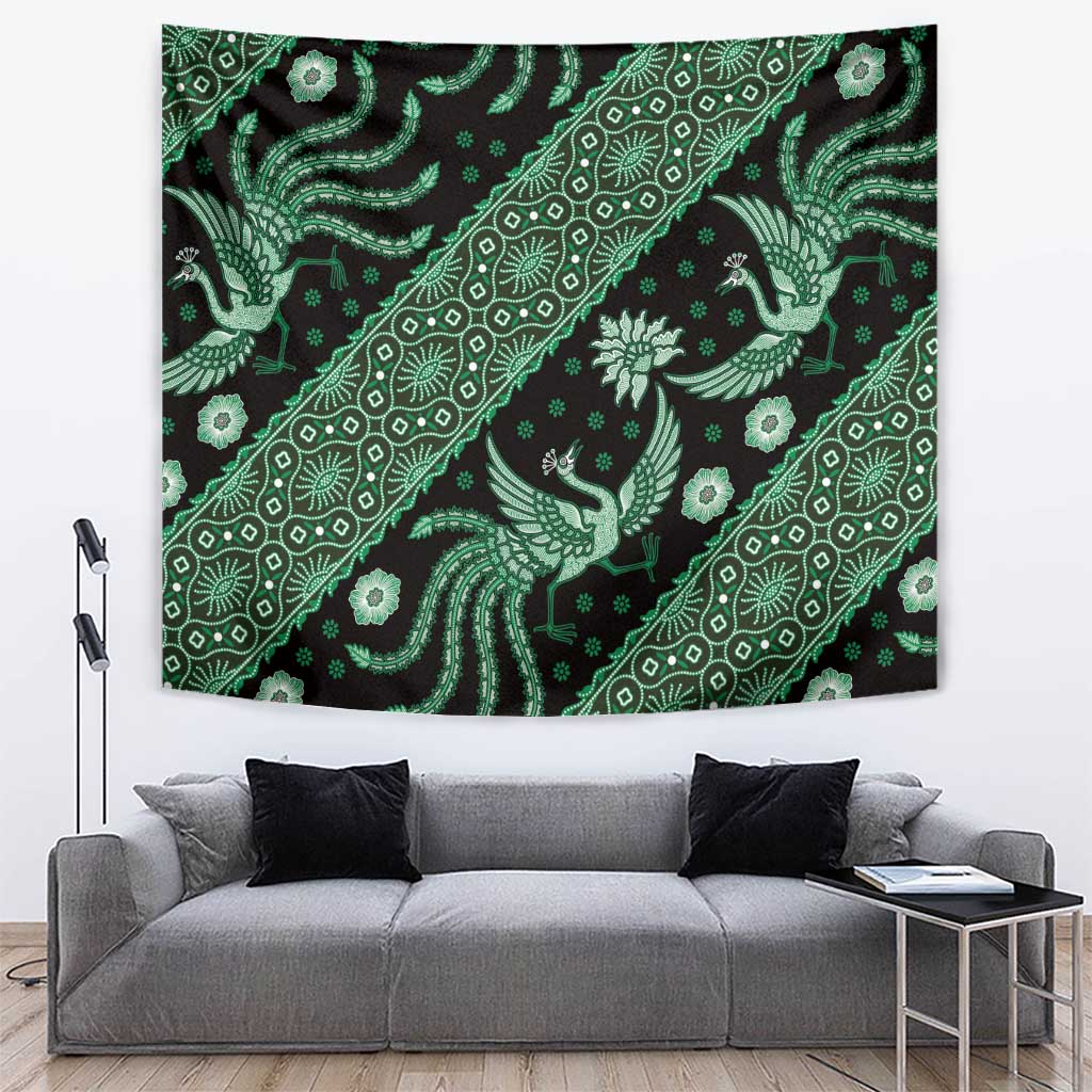 Green batik tapestry with diagonal repeat of stylized birds, flowers, and decorative borders.