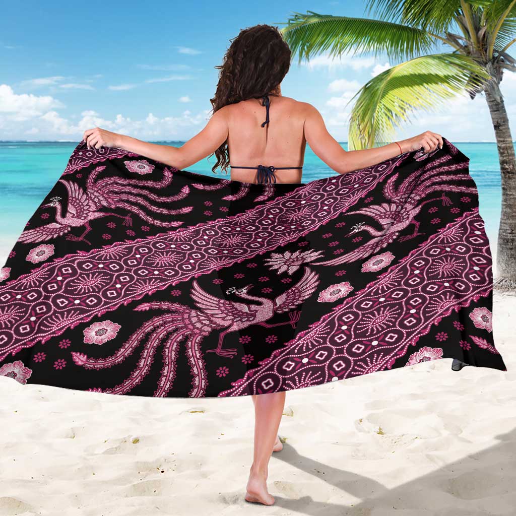 Pink and black batik-pattern sarong wrap, back view with bold paisley and floral print