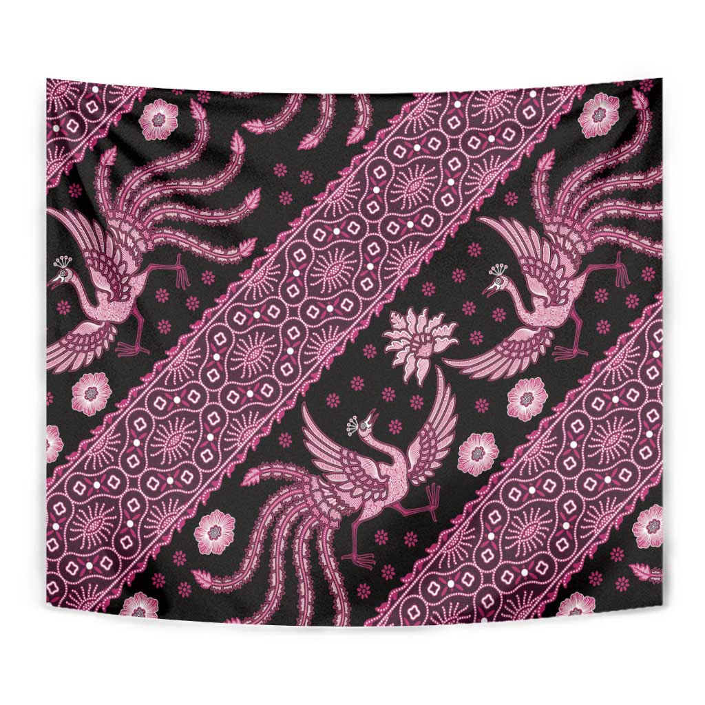 Pink Indonesian batik tapestry close-up with bird figures and floral medallion motifs