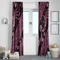 Pink and black batik-pattern window curtains on door panels