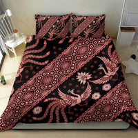 Batik bedding set close-up: red-and-black duvet with two pillowcases, birds and florals